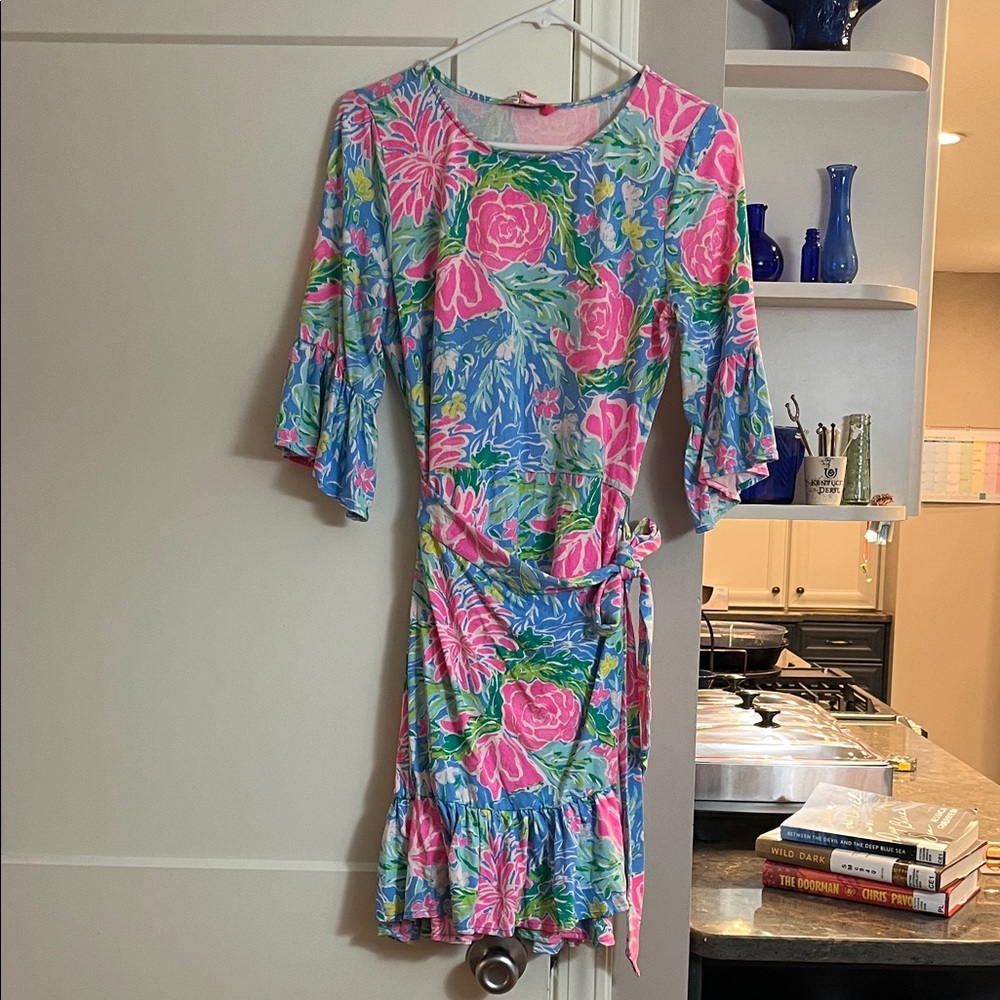 Floral Mini dress. 33" neckline to hem.  Faux wrap front.  Worn a few times.